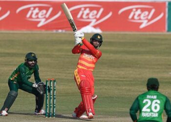Zimbabwe's Sean Williams (C) plays a shot during the third one-day international (ODI) cricket match between Pakistan and Zimbabwe at the Rawalpindi Cricket Stadium in Rawalpindi on November 3, 2020. (Photo by Aamir QURESHI / AFP)