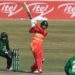 Zimbabwe's Sean Williams (C) plays a shot during the third one-day international (ODI) cricket match between Pakistan and Zimbabwe at the Rawalpindi Cricket Stadium in Rawalpindi on November 3, 2020. (Photo by Aamir QURESHI / AFP)