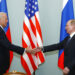 FILE - In this March 10, 2011, file photo, Vice President of the United States Joe Biden, left, shakes hands with Russian Prime Minister Vladimir Putin in Moscow, Russia. Putin won’t congratulate President-elect Joe Biden until legal challenges to the U.S. election are resolved and the result is official, the Kremlin announced Monday, Nov. 9, 2020. (AP Photo/Alexander Zemlianichenko, File)