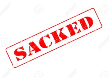Rubber stamp concept showing a red stamp reading Sacked