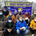 SRINAGAR, JAN 16 (UNI):- Members of Cricket Fraternity Dalgate distributing free face masks and sanitizers to the people, amid a surge in COVID-19 cases, in Srinagar on Sunday. UNI PHOTO-28U