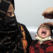 SRINAGAR, FEB 27 (UNI):- A health worker administering polio vaccine to a child at SMHS Hospital in Srinagar on Sunday during pulse polio immunization programme. UNI PHOTO-38U