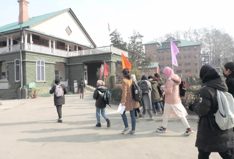 SRINAGAR, FEB 15 (UNI):- Students jubilant after reopening of Degree colleges in Kashmir division on Wednesday after a gap of nearly two-months. UNI PHOTO-34U