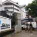 Srinagar: Security personnel outside the J&K Bank where raids by the state Anti-Corruption Bureau (ACB) are underway, in Srinagar on June 8, 2019. Within hours after the Jammu and Kashmir government sacked J&K Bank Chairman Parvez Ahmed, sleuths of ACB raided his office and residence in Srinagar. (Photo: IANS)